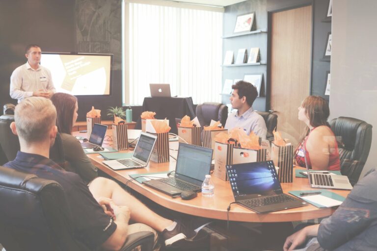 A team discussing website optimization strategies in a collaborative meeting environment.