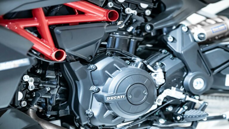 Close-up of a Ducati motorcycle engine showcasing intricate details to generate website leads.