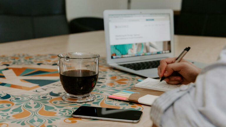 Social media optimization setup with coffee and laptop