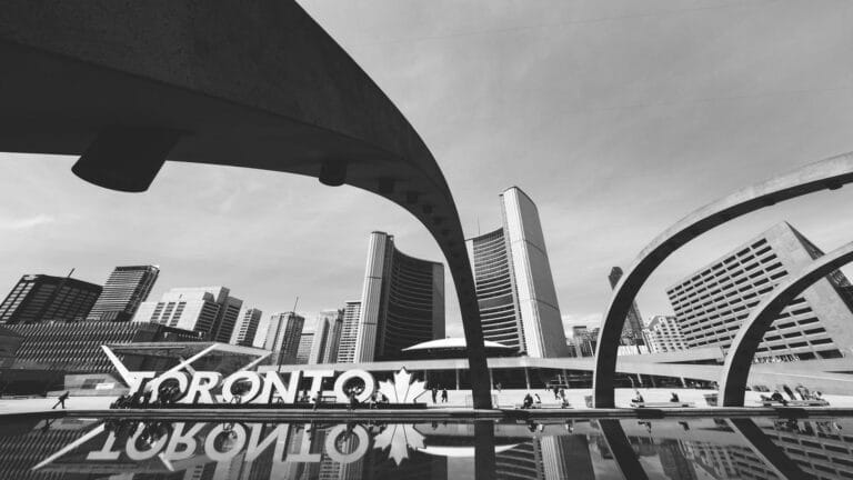 Toronto cityscape captured at Nathan Phillips Square highlighting social media presence