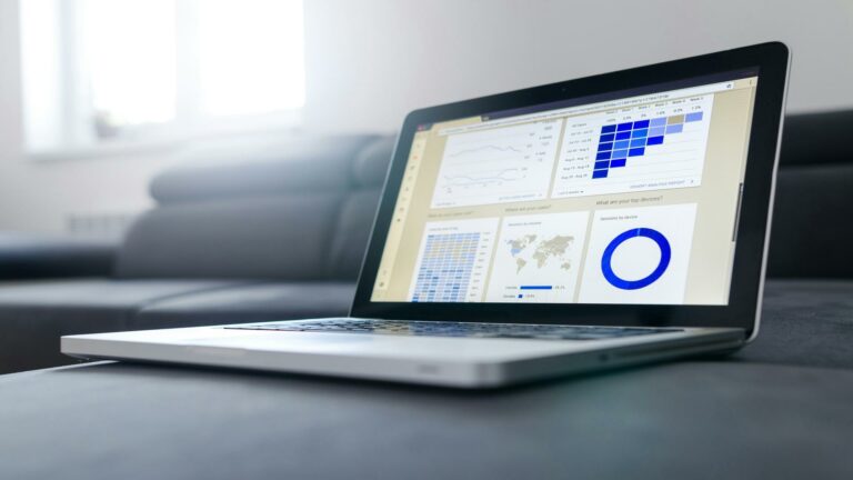 Laptop displaying analytics dashboard for local customer acquisition