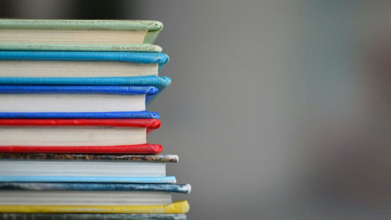 Optimize image sizes for a stack of colorful books