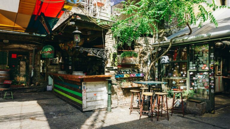 Rustic outdoor bar with colorful decor and seating, ideal for SEO audit services inspiration