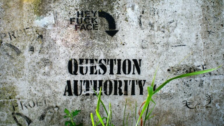 Website design company graffiti art with 'Question Authority' message