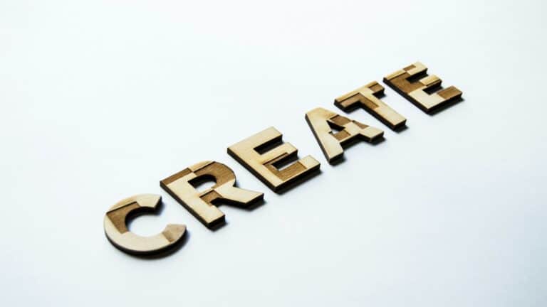 Wooden letters spelling CREATE for search engine rankings and web design services