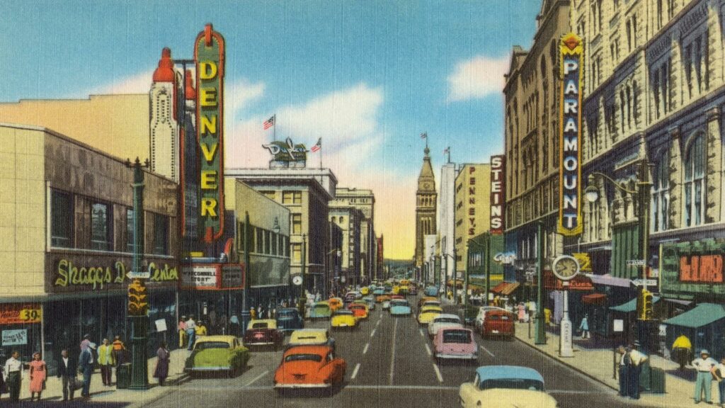 Vintage Denver street scene showcasing classic architecture and bustling activity, ideal for website design inspiration.