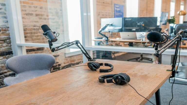 Professional podcast studio setup with microphones and headphones to increase website leads