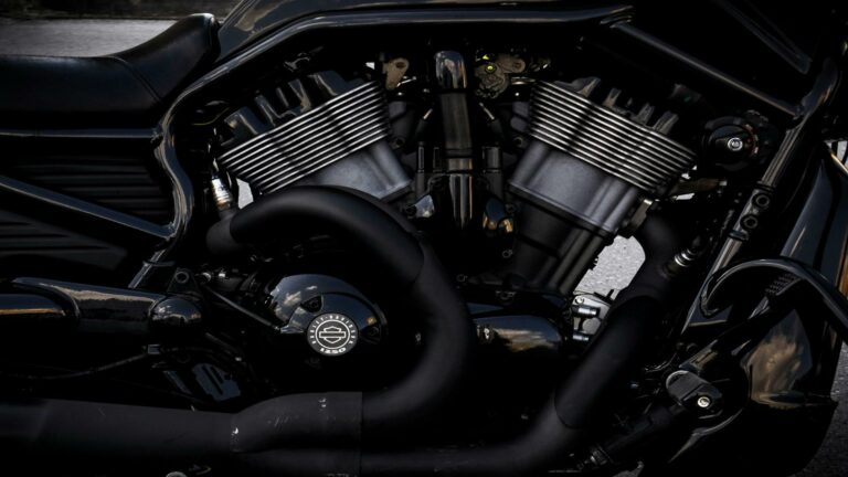 Close-up of a Harley-Davidson motorcycle engine showcasing its intricate design, emphasizing building online reputation.