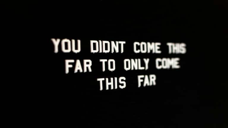 Content creation ideas - motivational quote saying 'You didn't come this far to only come this far' on a black background