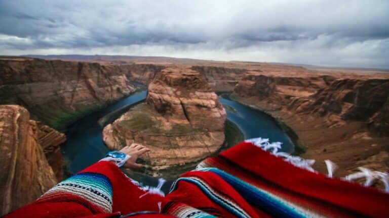 Horseshoe Bend scenic view with vibrant red blanket in the foreground, ideal for creating engaging blogs