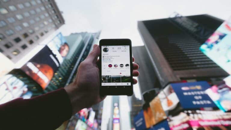 Content marketing tips displayed on a smartphone in Times Square