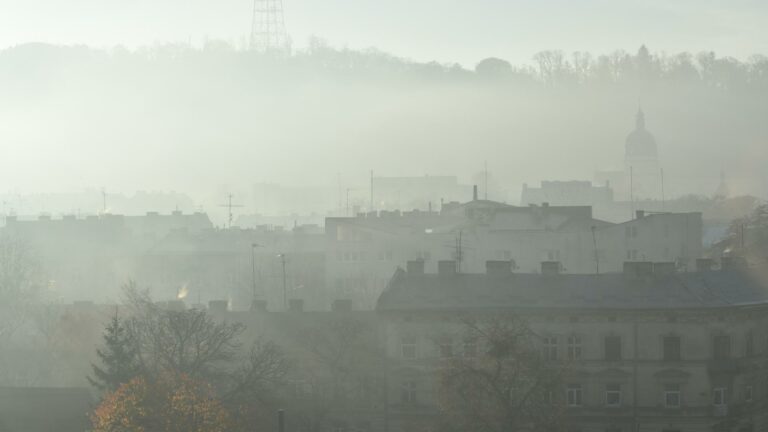 Foggy cityscape in London captured by Web Design London, showcasing urban architecture and misty atmosphere.