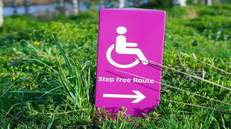 Step free route sign promoting accessibility in web design and hosting services