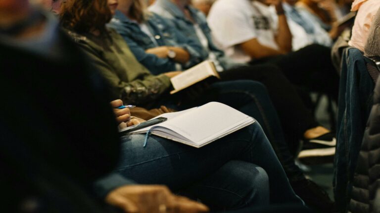 Audience engaging in a workshop on effective online marketing strategies